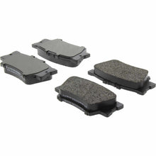 Load image into Gallery viewer, Posi-Quiet Extended Wear Semi-Metallic Brake Pads with Shims and Hardware - Centric Parts 106.12120